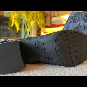 Circus by Sam Edelman glittery boot with blue jewels.